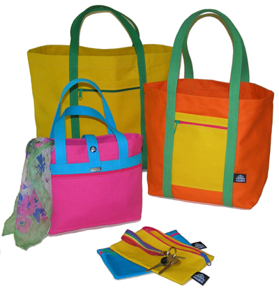 Three totes shown in various colors. A couple of Accessories round out the picture.